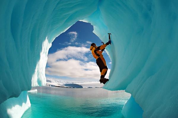 Climbing an ice cave in Antarctica